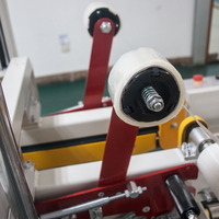 Machine de scellage automatique électrique GURKI de type H pour l'adhésion des coins et des bords des boîtes, cartons et emballages de produits chimiques
