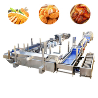 Complete productielijn voor kipnuggets met vormgeving, paneren, frituren, koelen en vriesen.