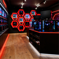 Vitrine d'exposition moderne personnalisée en acier inoxydable et verre, éco-responsable, avec éclairage LED pour magasin de jeux informatiques et commerce de détail