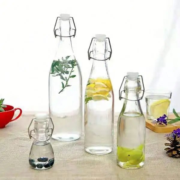 Bottiglia di vetro cilindrica con altalena prodotta in fabbrica