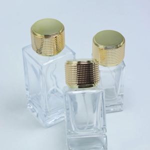 Nuevo pulverizador de perfume polaco con bomba, cuadrado, vacío, de 30ml/50ml/100ml, de vidrio serigrafiado, con tapa dorada y caja metálica. - Product Image 4