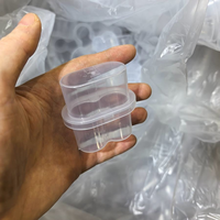 Boîte en plastique recyclé transparente noire et blanche de petite taille avec couvercle pour le rangement de petits flacons
