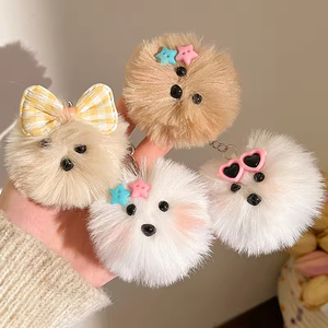 En gros, Porte-clés et breloque de sac en peluche chien mignon avec nœud, <span class=keywords><strong>pompon</strong></span> moelleux et lunettes, doux, durable, pour sac à dos, pendentif ou figurine - Product Image 1
