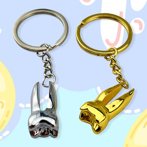 Porte-clés personnalisé en alliage de zinc, petit pendentif dentaire mignon, cadeau promotionnel pour événement dentaire, porte-clés créatif en forme de dent dorée - Product Image 2