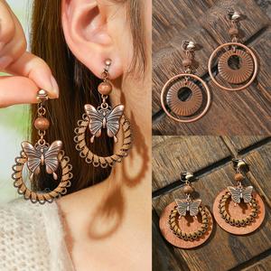Pendientes colgantes de mariposa con clip, chapados en bronce antiguo, estilo bohemio, joyería de moda para mujer 2024 - Product Image 1