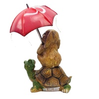 Statue de jardin solaire Lapin de Pâques extérieur, lapin assis sur une tortue, tenant un parapluie, avec guirlande lumineuse
