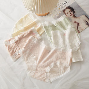 Braguitas de encaje sexy de talle medio para mujer, con lazo, transparentes, de color liso, estilo hipster, con parte inferior de algodón transpirable y antibacteriana, tejidas para uso diario. - Product Image 3