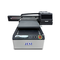 Printer UV Flatbed Resolusi Tinggi dengan Ketinggian yang Dapat Disesuaikan A1 Printer UV DTF Flatbed Vacuum Table Printer UV Flatbed 6090