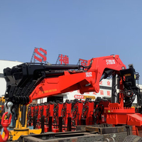 La logistique du port maritime utilise une grue hydraulique à usage intensif montée sur camion 50 tonnes 60 tonnes avec télécommande sans fil