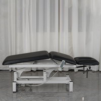 Lit de salon de beauté médical gris noir de luxe 3 moteurs Table de massage électrique lit cosmétique facial moderne à vendre
