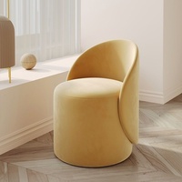 Fauteuil de loisirs minimaliste moderne et tabouret de maquillage pour salon avec dossier pivotant. Options de couleurs de tissu disponibles. Meubles de maison