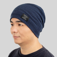 Venta al por mayor de acrílico a cuadros Jacquard de punto aislado Slouchy Knit Oversized Long Winter Slouch Rasta Hat Reggae Cap Beanie para mujeres