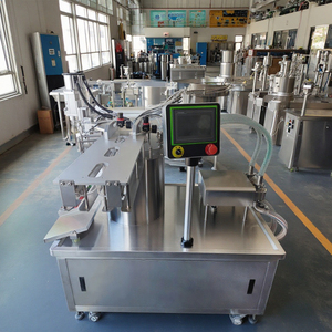 Machine de remplissage automatique à double tête et de capsulage de sachets à bec verseur pour l'industrie - pour l'emballage de lait, de miel et de produits laitiers en sachets à bec verseur - Product Image 3