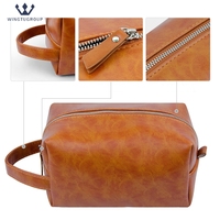 Sac de maquillage portable en PU imperméable de couleur unie avec logo personnalisé pour femmes, sac de rangement pour cosmétiques, sac de toilette de voyage