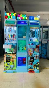 Lifun Amusement Business Mini Gamer Spin Lucky Spin-N-Drop Clip Prize <strong>Game</strong> <strong>Machine</strong> with Prize Locker Portable Claw Doll Grabber - Product Image 3