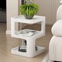 Table basse minimaliste moderne en fer avec plateau en verre et étagère de rangement pour chambre et salon