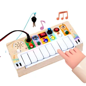 畅销儿童木制早教多功能音乐忙板电子琴带发光二极管灯玩具