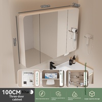Armoire de salle de bain intelligente et moderne avec miroir lumineux, double porte et rangement, idéale pour hôtels, salons, gymnases et appartements.