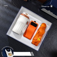 Articles promotionnels 3 en 1 Flacon sous vide Masseur de cou Power Bank avec parapluie personnalisé Coffret cadeau d'entreprise de luxe