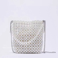 Nouveau sac seau tendance pour femme, en cuir de poisson texturé, orné de perles blanches, style féerique, avec chaîne bandoulière, porté épaule ou à la main, style urbain