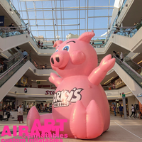 Ballon gonflable de cochon assis, mascotte de cochon rose gonflable de mascotte de dessin animé
