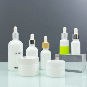 Cosmetic Essential Oil Glass <b>Bottle</b> 10ml 15ml 20ml 30ml 50ml Silk Screen White Opal Serum <b>Bottle</b> With Bamboo Cap - Product Image 6