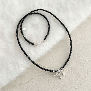 Collar con Colgante de Lazo y Cuentas de Ónix Negro en Plata de Ley 925, Diseño Único y Elegante de Dylam para Mujer - Product Image 2
