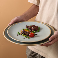 Assiettes en céramique de style occidental pour la maison, assiettes à steak rétro haut de gamme au design moderne et épuré, assiettes plates commerciales pour restaurants et hôtels