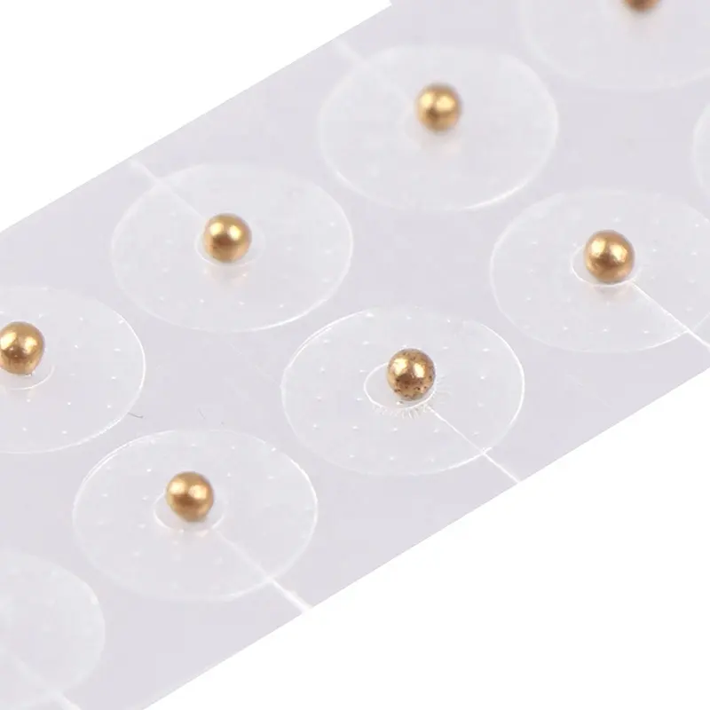 100PCS 24K chapado en oro transparente oído punto pegatinas presión en el oído de acupuntura magnética cuentas Auricular oído semillas