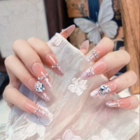 Vente en gros OEM ODM Faux ongles à presser, dégradé de paillettes, strass, papillon, luxe, pour Noël