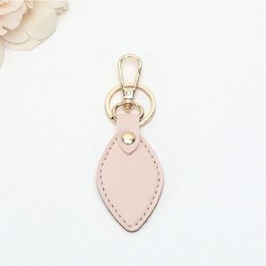 Wholesale Portable PU Leather Keychain Customizable Colorful Waterproof <b>Key</b> <b>Ring</b> Concise Durable <b>Bag</b> Charm Promotional Gift - Product Image 1