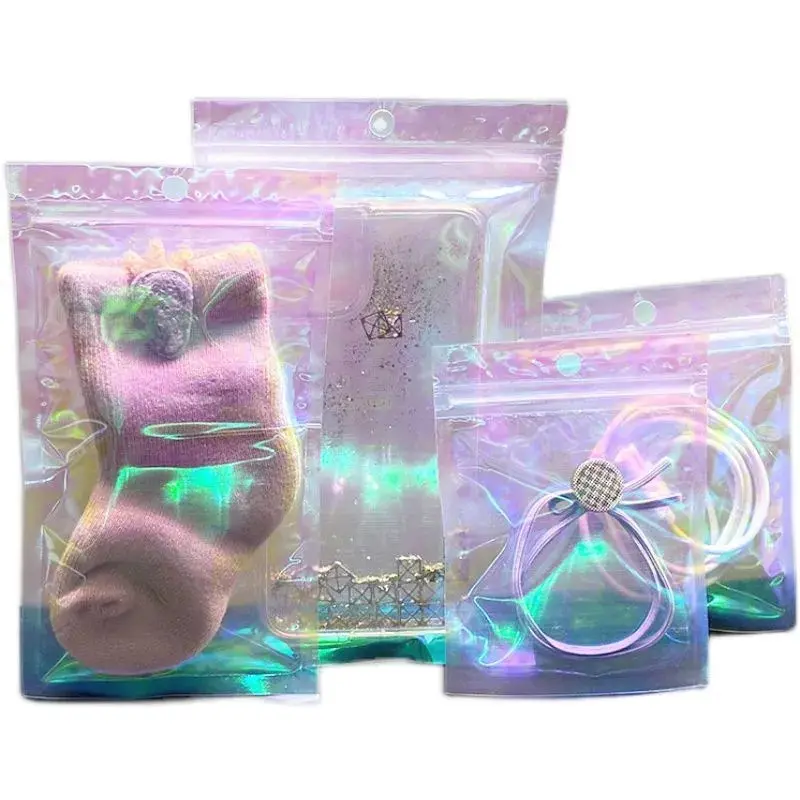 Düşük MOQ stok çanta tatlılar üç tarafı kapalı torba holografik Mylar kilitli ambalaj şeffaf plastik takı çantaları