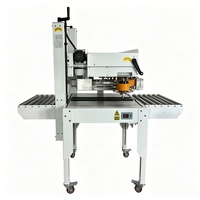 Machine de scellage latéral semi-automatique BFCG5040-21 pour boîtes en carton et en mousse, scelleuse latérale à ruban adhésif pour la logistique d'entrepôt et les lignes d'emballage automatiques