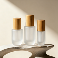Penjualan Panas Kemasan Kosmetik Botol Semprot Losion Kaca Buram 30ml 50ml dengan Tutup Bambu