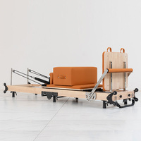 Reformer Pilates pliable en cuir personnalisé, avec cadre en bois d'érable et pieds en fer, gain de place, pour studio à domicile