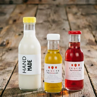 Bouteilles en verre rondes personnalisables avec bouchons scellés, emballage pour jus et lait, bouteilles vides
