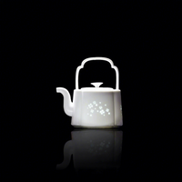 Service à thé en céramique de luxe avec théière et 4 tasses, design Lan Yu à quatre feuilles, élégant coffret cadeau de thé chinois