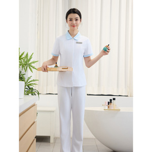 Women Medical Uniform Set Short Sleeve White Top Light Blue Pants Moisture Wicking For Beauty Spa Nail Salons - Product Image 1