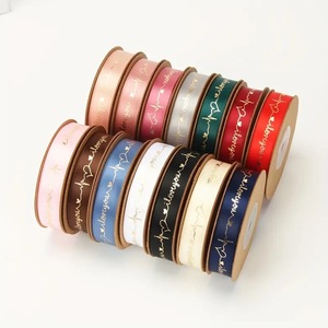 Pita Dekorasi Stamping Emas 2.5cm untuk Kemasan Bunga Hari Valentine Grosir Pabrik - Product Image 1
