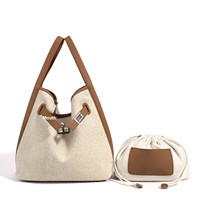 Sac seau en cuir véritable ODM OEM personnalisé 2026, nouvelle collection, style urbain épuré, sac à main femme en forme de panier avec fermeture à boucle et blocs de couleur