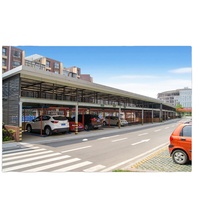 Système de stationnement robotisé à plusieurs étages, système de stationnement automatique des véhicules, parking vertical compact