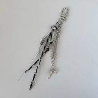 Chaîne de sac et de téléphone Y2K tendance, porte-clés punk en plastique noir et argenté, avec cordon tressé en os de serpent et pendentif perle