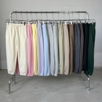 Pantalon de jogging fuselé en coton 400 GSM personnalisé OEM avec cheville élastiquée, style streetwear décontracté et épais, petite série