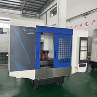 Centre d'usinage CNC vertical V1000, poids total de la machine 3,9 tonnes, tolérance de positionnement ±0,005 mm/300 mm