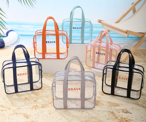 Organisateur de maquillage transparent avec poignée pour les voyages et l'usage quotidien, en PVC, pour la plage - Product Image 1