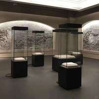 Vitrine d'exposition culturelle de luxe moderne, sur mesure, en acier et verre trempé, avec éclairage LED, écologique