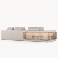 Canapé d'angle en cuir véritable italien de luxe moderne de qualité supérieure avec étagère LED intégrée pour espaces de vie sophistiqués