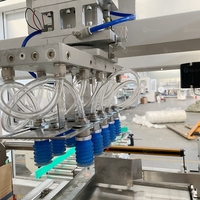 Palettiseur robot de bouteilles 20kg 25kg 30kg Machine de chargement et de déchargement automatique