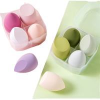 Boîte brevetée à quatre grilles ensemble de houppette avec gourde goutte d'eau biseautée coupe échantillon gratuit oeuf maquillage coton pour la beauté