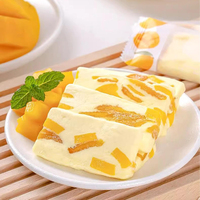 Bonbons à la mangue moelleux, nougat, crème anglaise, bonbons au lait, friandises aux fruits tropicaux, sans arômes artificiels, style artisanal, fabrication artisanale, fourniture d'usine